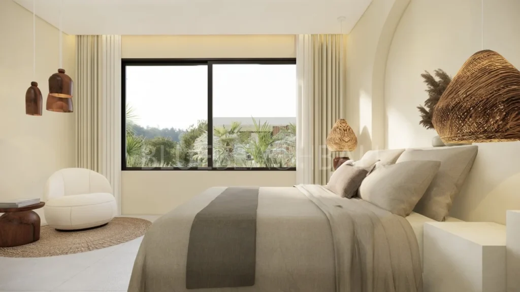 a bedroom with trees view